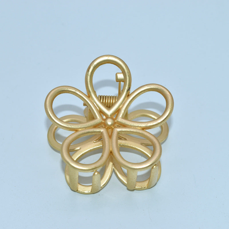 Golden hair clip