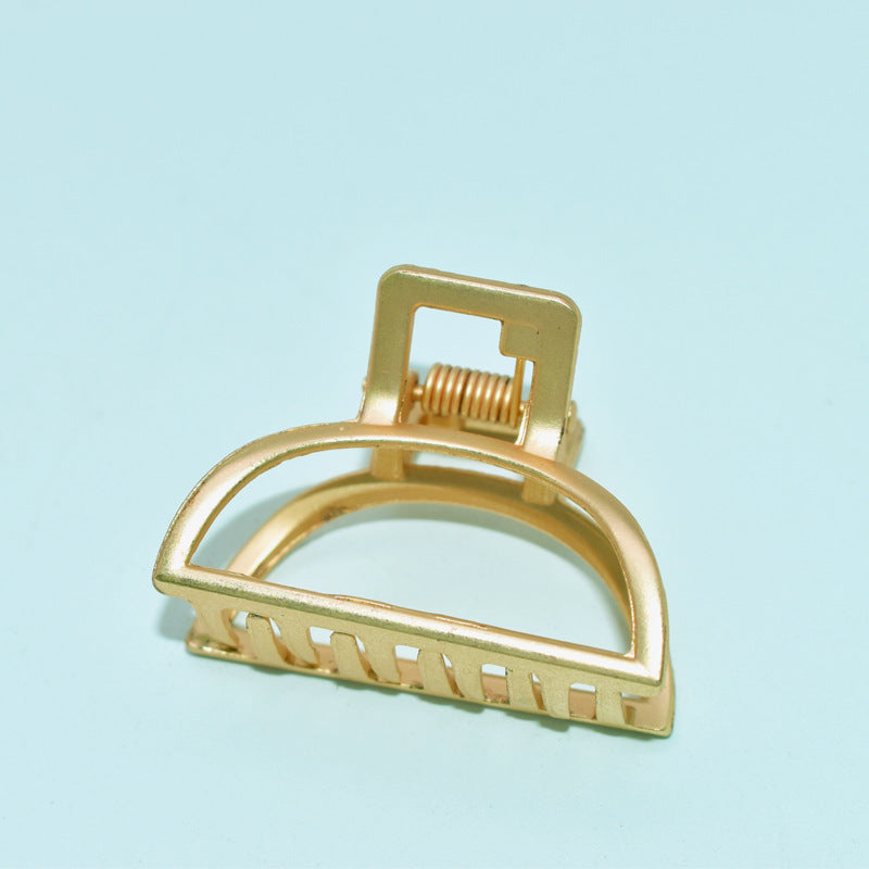 Golden hair clip