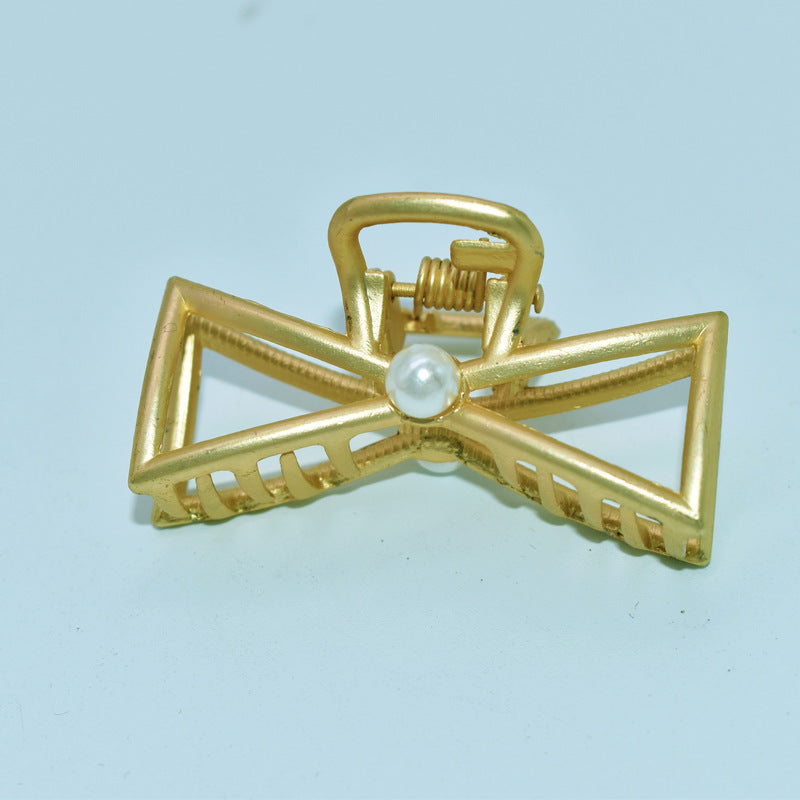 Golden hair clip