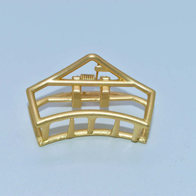 Golden hair clip